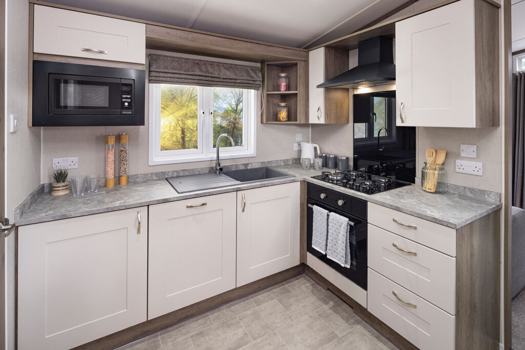 Fitted kitchen in a two-bedroom holiday lodge